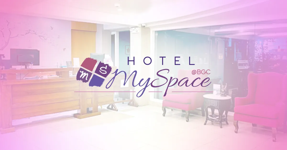 Hotel MySpace @BGC logo displayed over a cozy hotel lobby with wooden front desk and red armchairs.